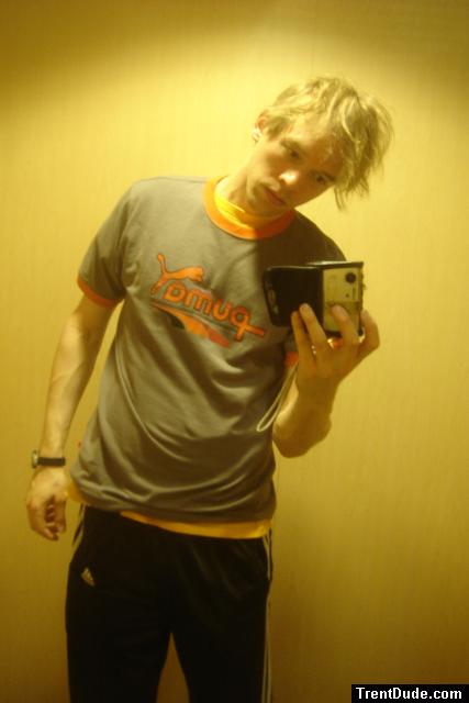 Puma t-shirt, addias pants (in a dressing room)