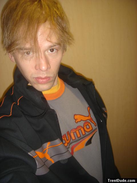 Puma t-shirt, addias pants, puma hoodie (in a dressing room)