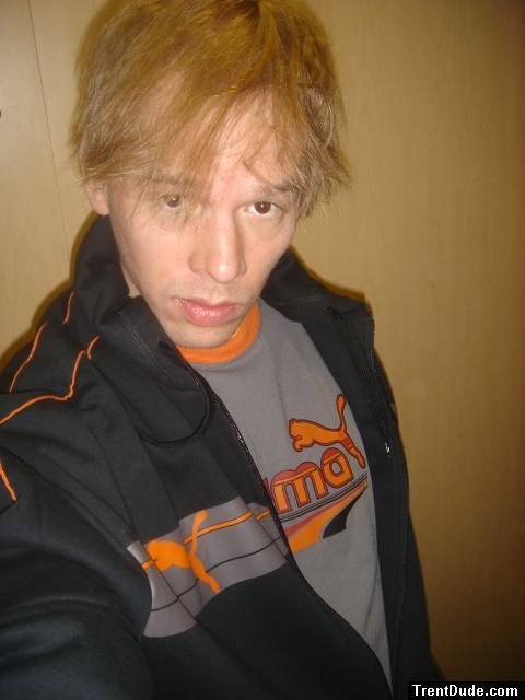 Puma t-shirt, addias pants, puma hoodie (in a dressing room)