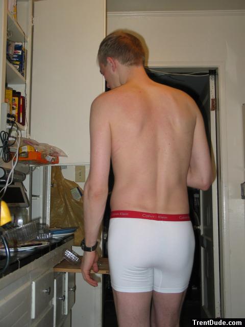 swimmer back muscles - Calvin Klein white boxer briefs in the kitchen