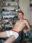 Calvin Klein white boxer briefs - sitting in a chair