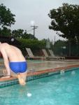 Blue Nike speedo (feet, butt)