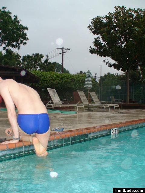 Blue Nike speedo (feet, butt)