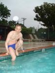 Getting ready to swim in a blue Nike speedo