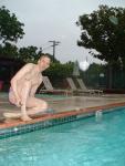 He is wearing a blue Nike speedo