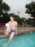 Stretching in a Blue Nike Speedo