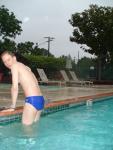 Climbing out in a blue Nike speedo (butt)!