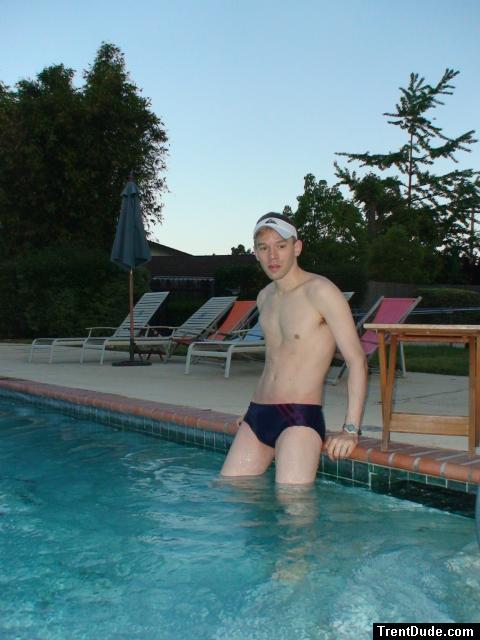 Getting in the pool in Blue/Red stripes Speedo!