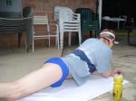 Morning stretches in Blue Nike swim brief