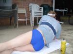Morning stretches in Blue Nike swim brief (butt)