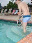 streching in Calvin Kelin Swim Boxer - Lagoon/Marina - from Macys.com (butt!)
