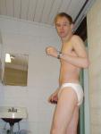 Trying on the white speedo in the locker room
