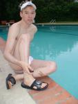 Poolside in a white speedo