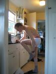 Pulling off his socks