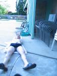 Doing a push up and stretches in a Calvin Klein swim boxer