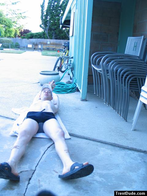 Doing a push up and stretches in a Calvin Klein swim boxer