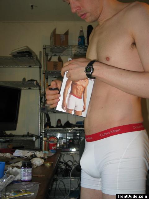 Opening his new pair of boxer briefs