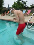 Checking out his new Dolphin jammers (back)