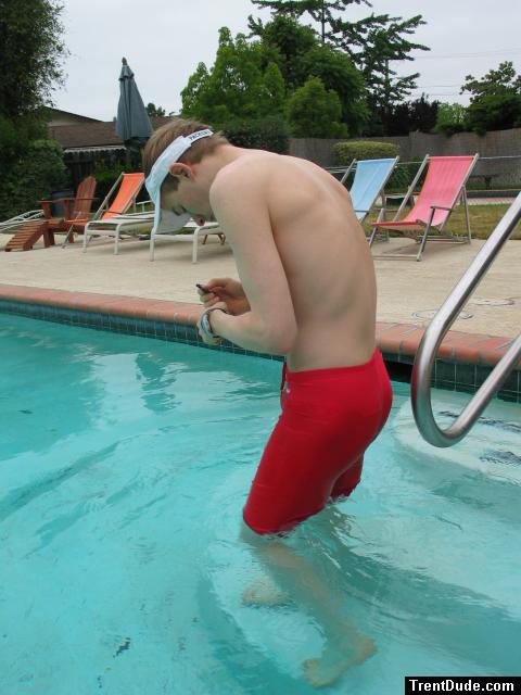 Checking out his new Dolphin jammers (back)