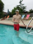 Standing in a Dolphin swim jammer