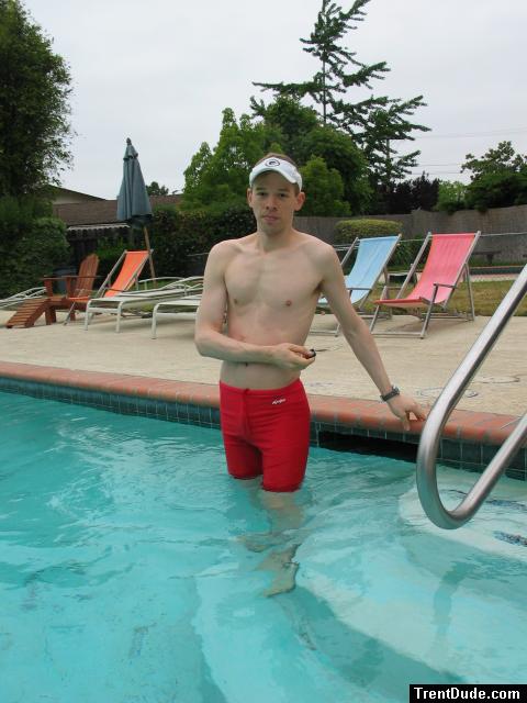 Standing in a Dolphin swim jammer