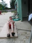 Doing sit-ups in the Dolphin jammer (toes)