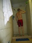 Washing his hair after a workout