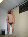 swimmer changing in the locker room