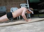 Push-ups in a Speedo Drag suit (rear, legs)