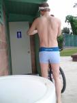 Swimmer/biker body in Calvin Klein swim boxer (rear, back)