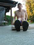 Sitting on a matt stretching