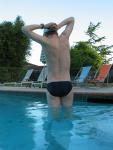 Stretching his shoulders