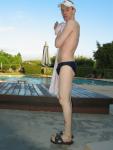 Swimmer showing body in a blue speedo brief