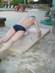 doing a pushup wearing a Speedo Solar 1" Swim Brief from Macys.com