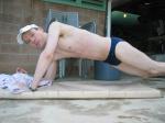 doing a pushup wearing a Speedo Solar 1" Swim Brief from Macys.com