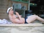 Sit-ups in a blue speedo