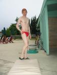 Trying to look cute in his new red speedo?