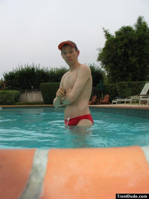 Smiling in his red speedo