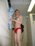 His team mates are laughing at him in his red Speedo