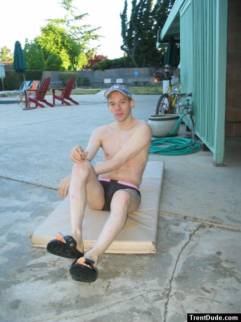 swimmer doing some stretches in Nike Bati Slide slippers