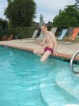 posing for photos in a Maroon Speedo Aquablade swim brief