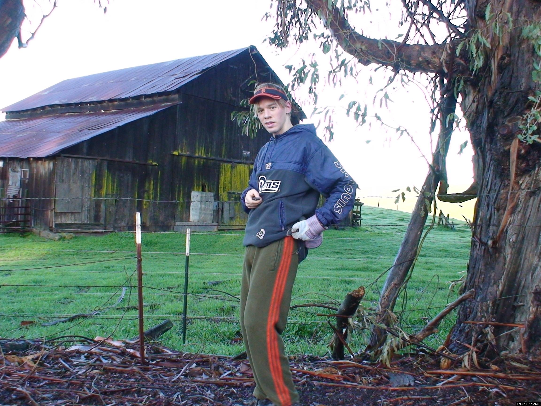 Farm person in front of barn!