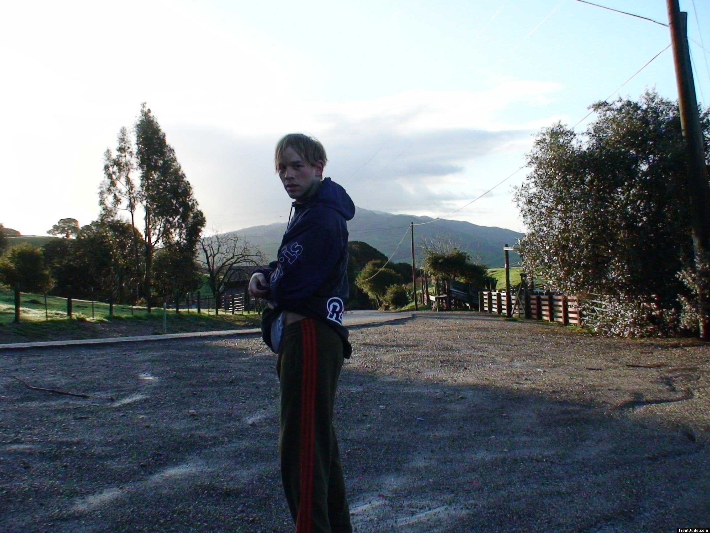 farm person in Rams windbreaker, Addias sweat pants