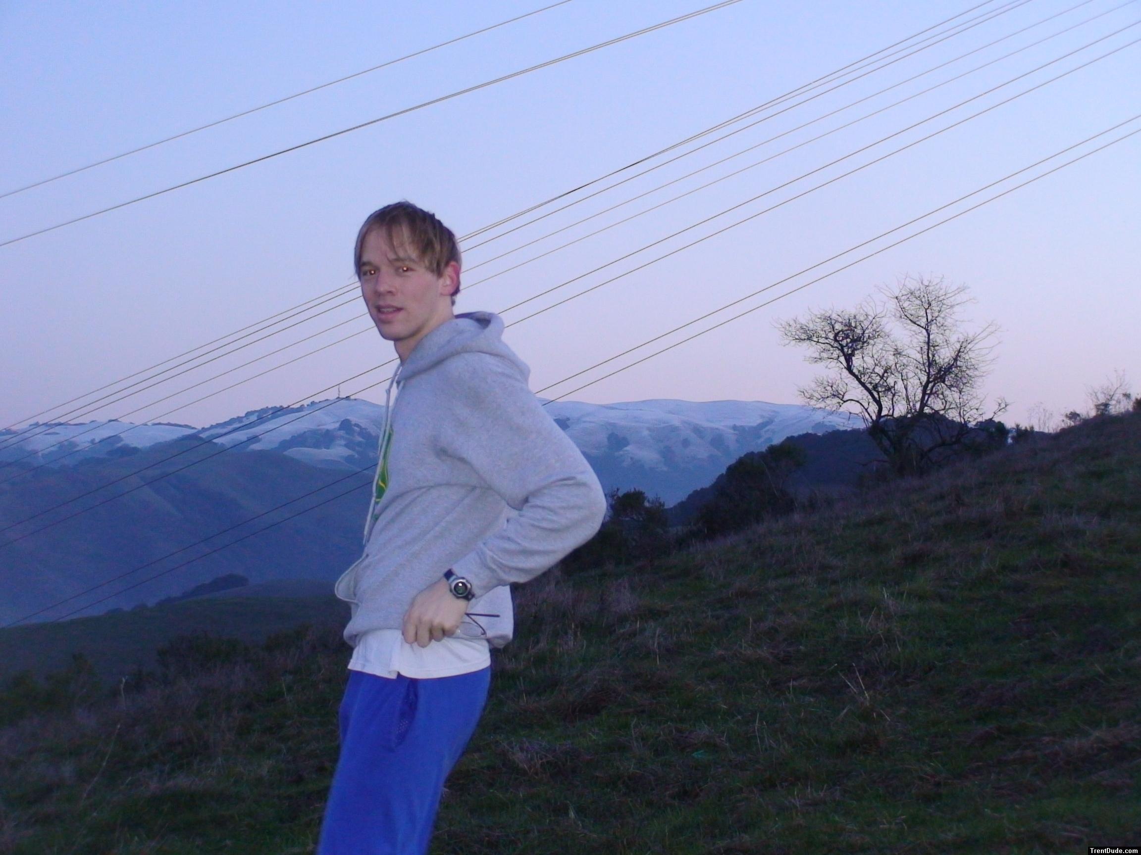 John deere sweatshirt, blue sweat pants, snowy mountain!