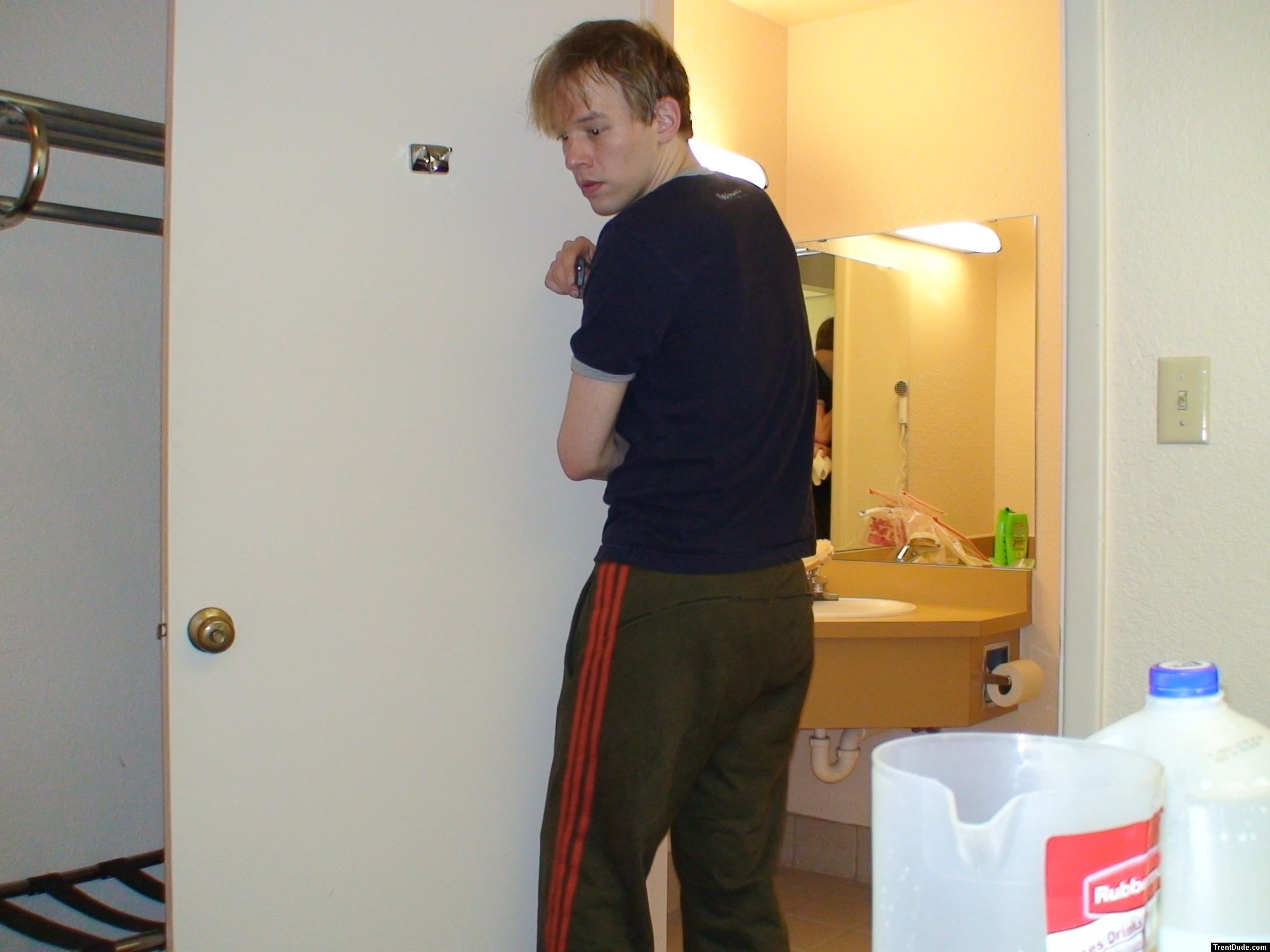 Blue shirt and Addias Sweat pants (butt)