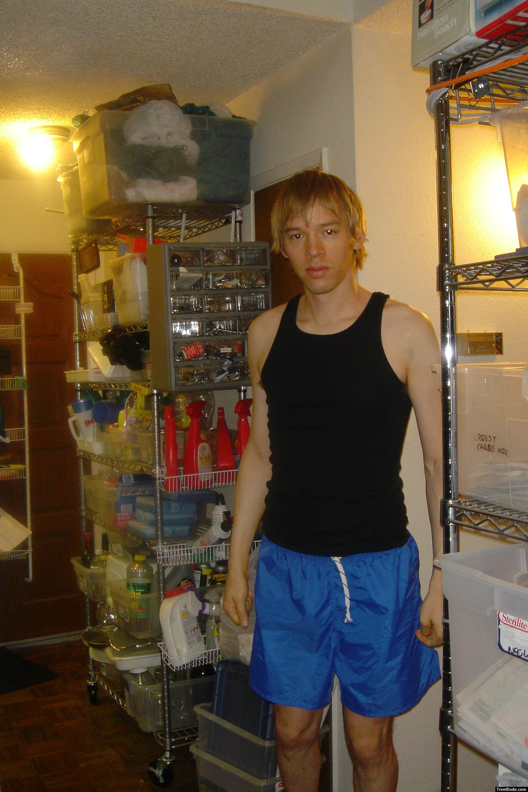 black wifebeater (for sale) and blue lycra shorts