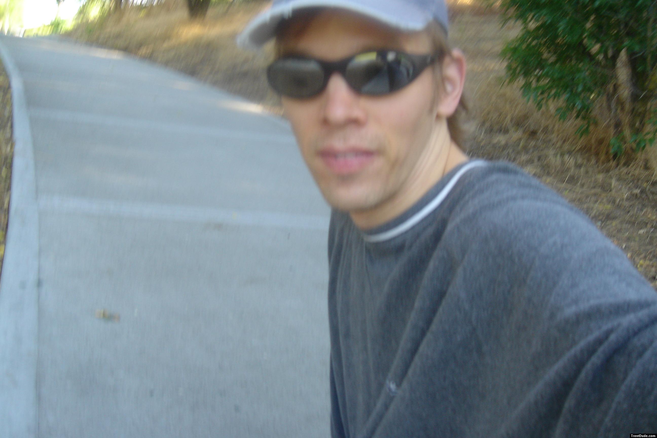 Black Ray Ban sunglasses, unshaven
