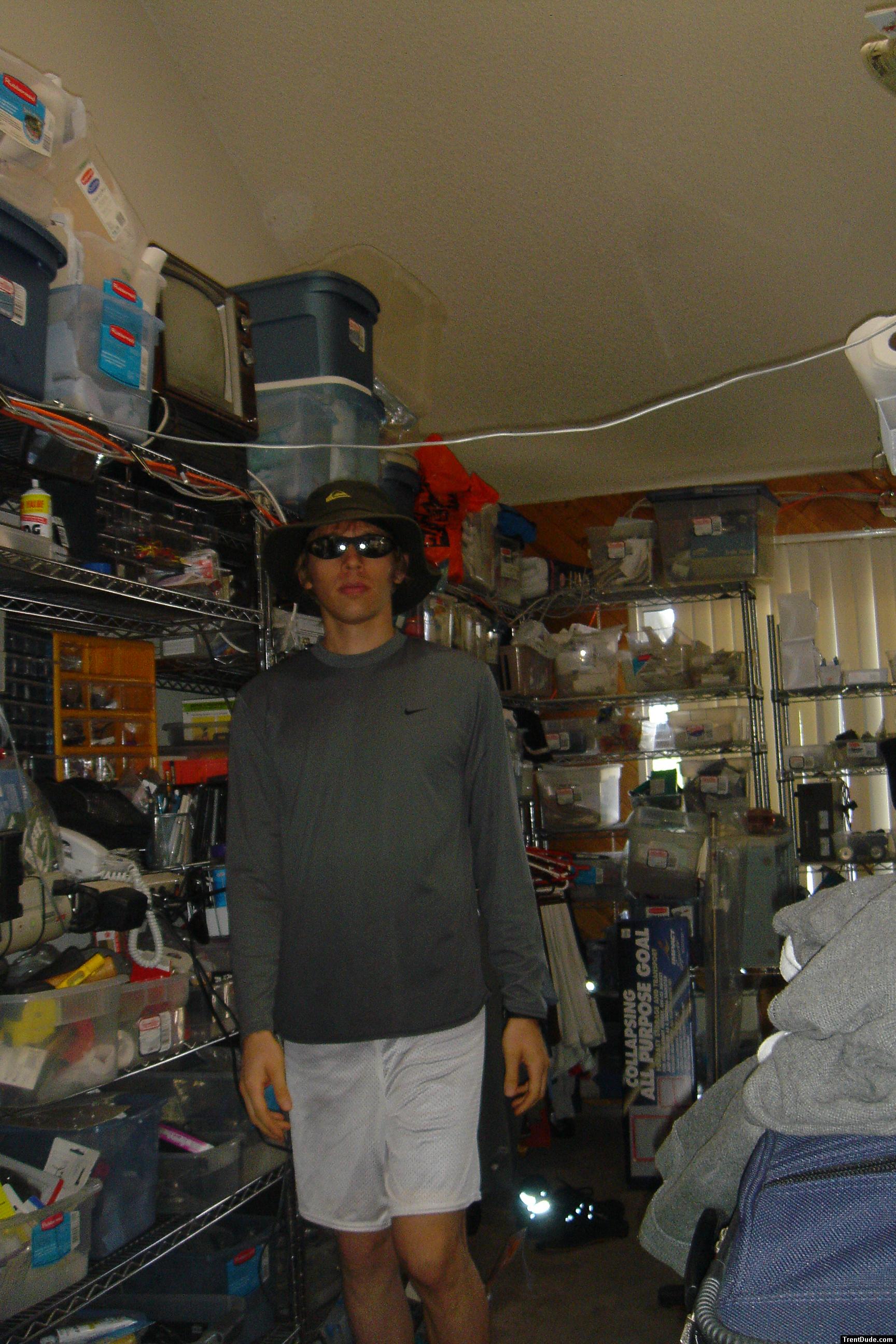 Trent wearing Quiksilver Full safari hat, Ray-ban sun glasses, Nike exercise shirt, Dodger water pants.  This outfit is forsale!