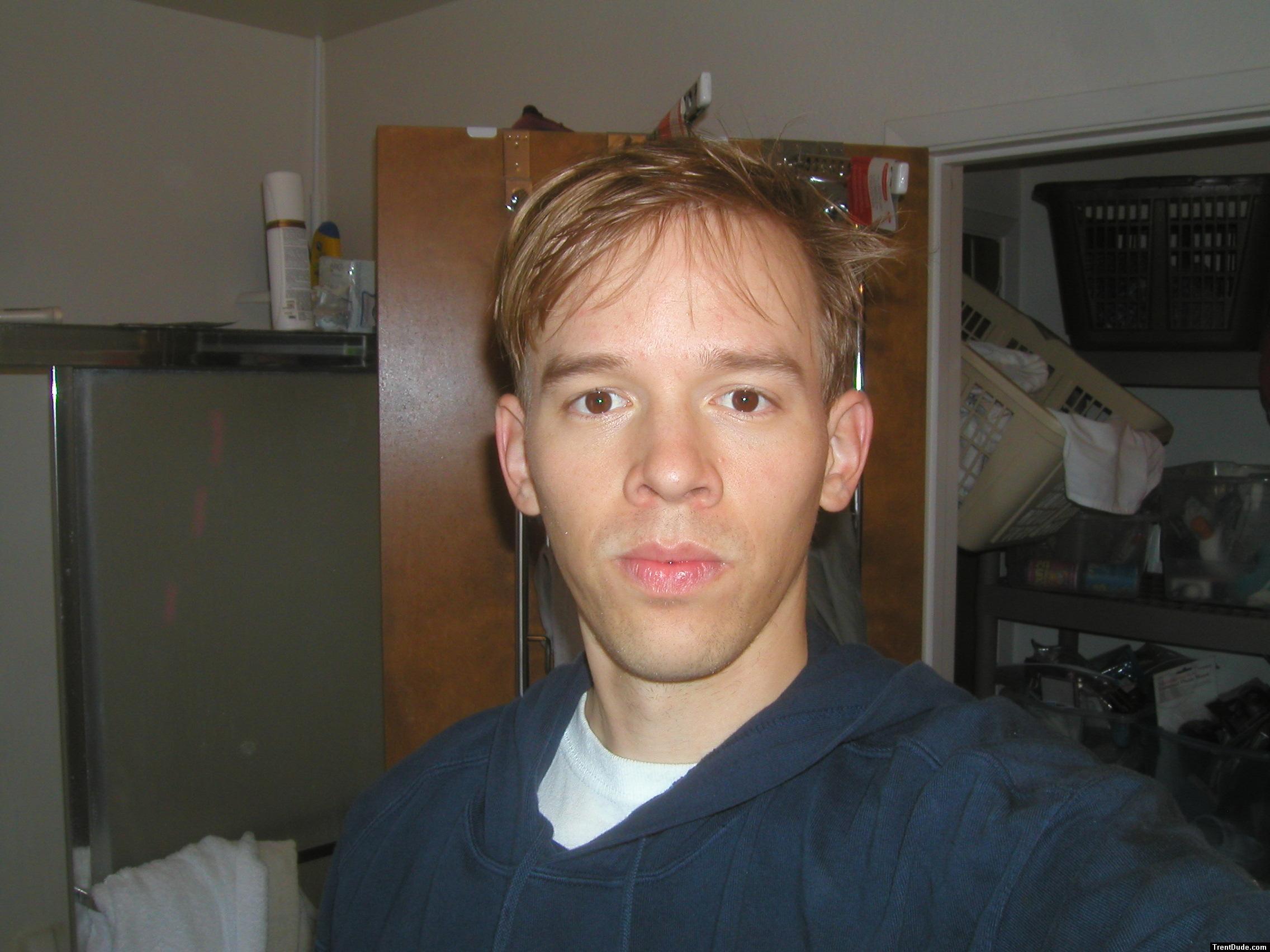 Blue sweat shirt  - looks to angry