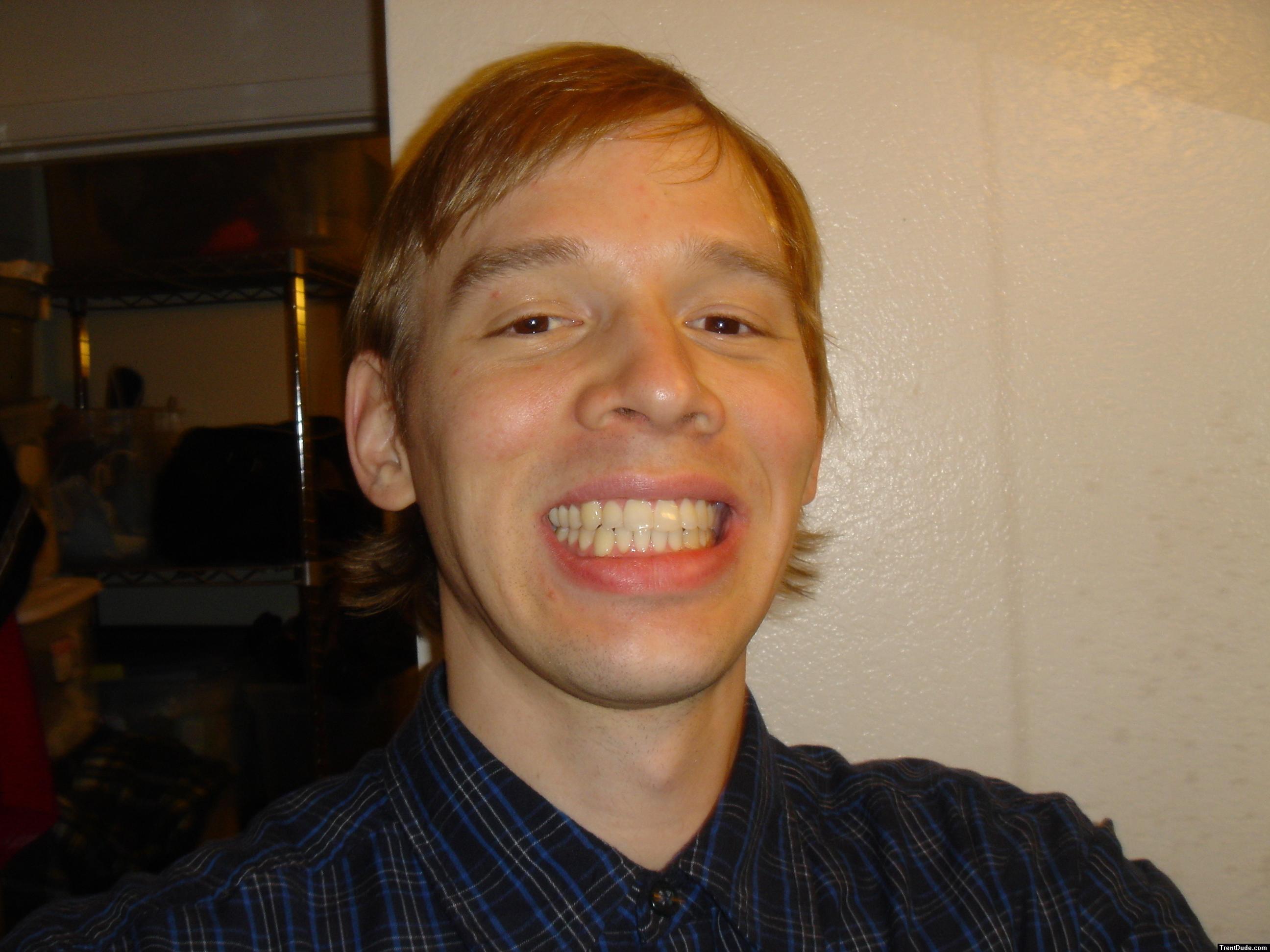 Teeth in button up shirt
